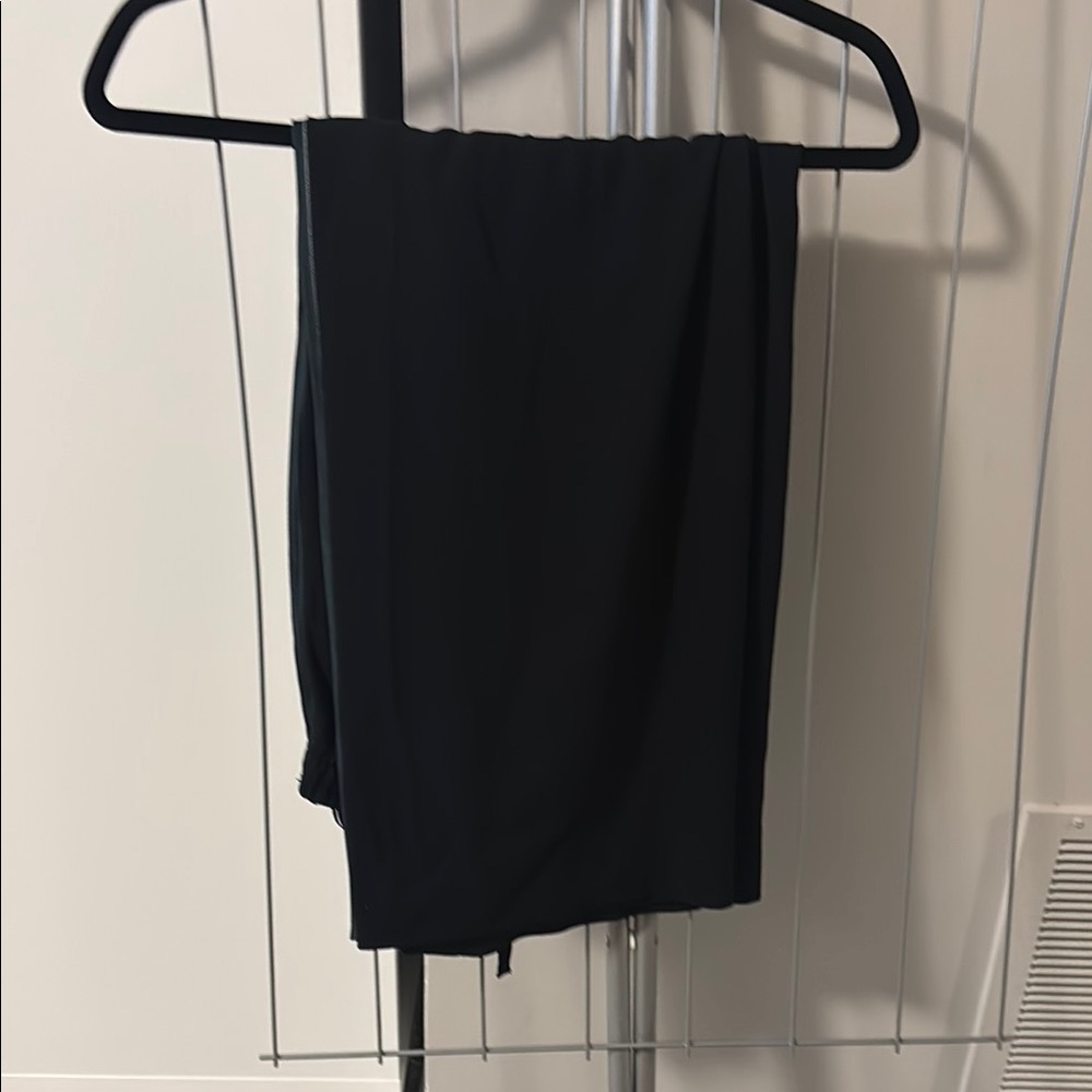 Aritzia Babaton black cropped culottes with buttons on side.